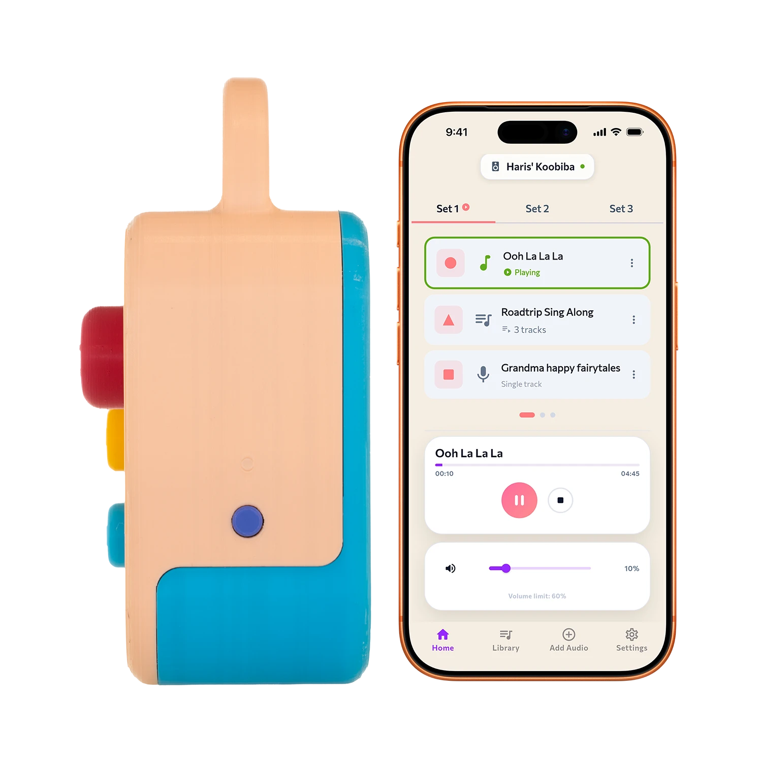 A Koobiba beside a phone showing the app that loads audio onto it