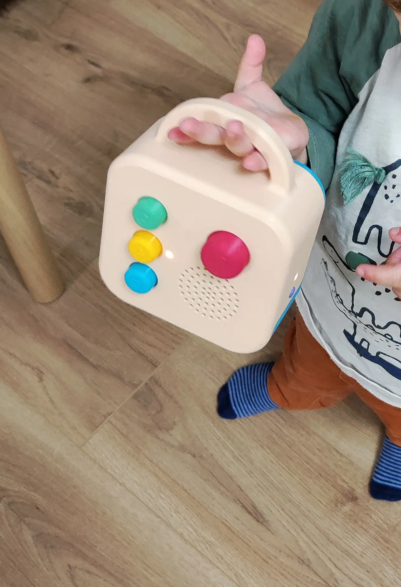 A child holding a Koobiba by its handle